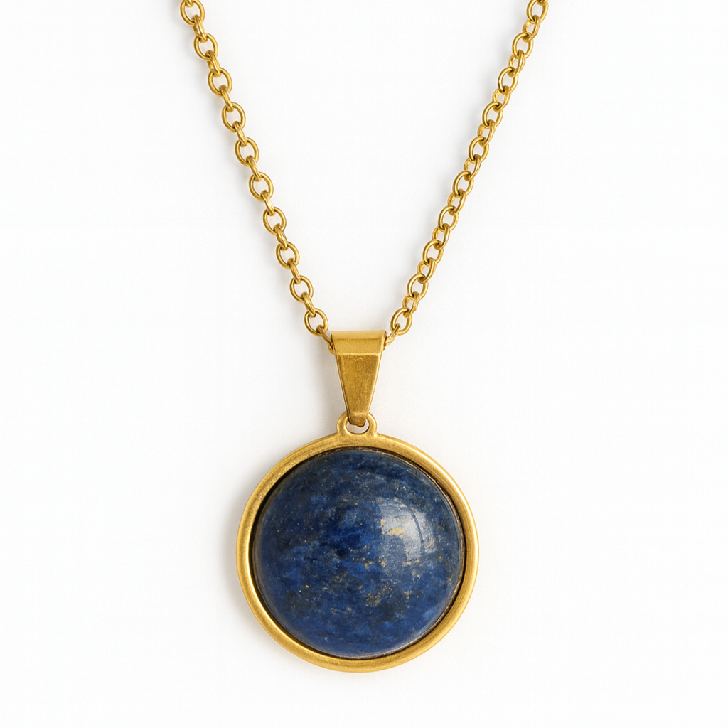 Gold necklace with a blue stone pendant on a white background