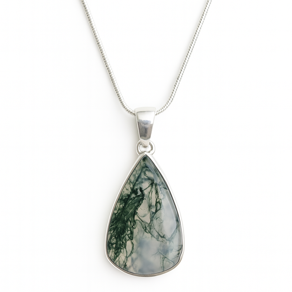 Teardrop-shaped pendant necklace with a green stone on a white background