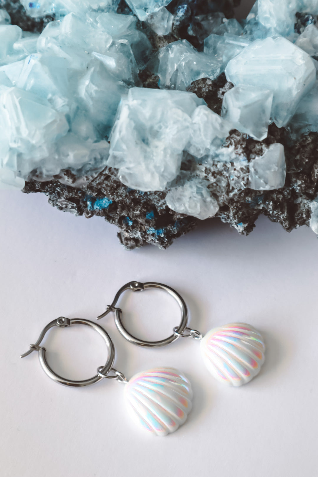 Seashell Aura Huggie Hoop Earrings Silver, white mermaid core jewelry, ocean inspired syle, handmade shell earrings, summer jewellery, mermaidcore earrings, jewelry made with shells, festival jewelry, festival earrings
