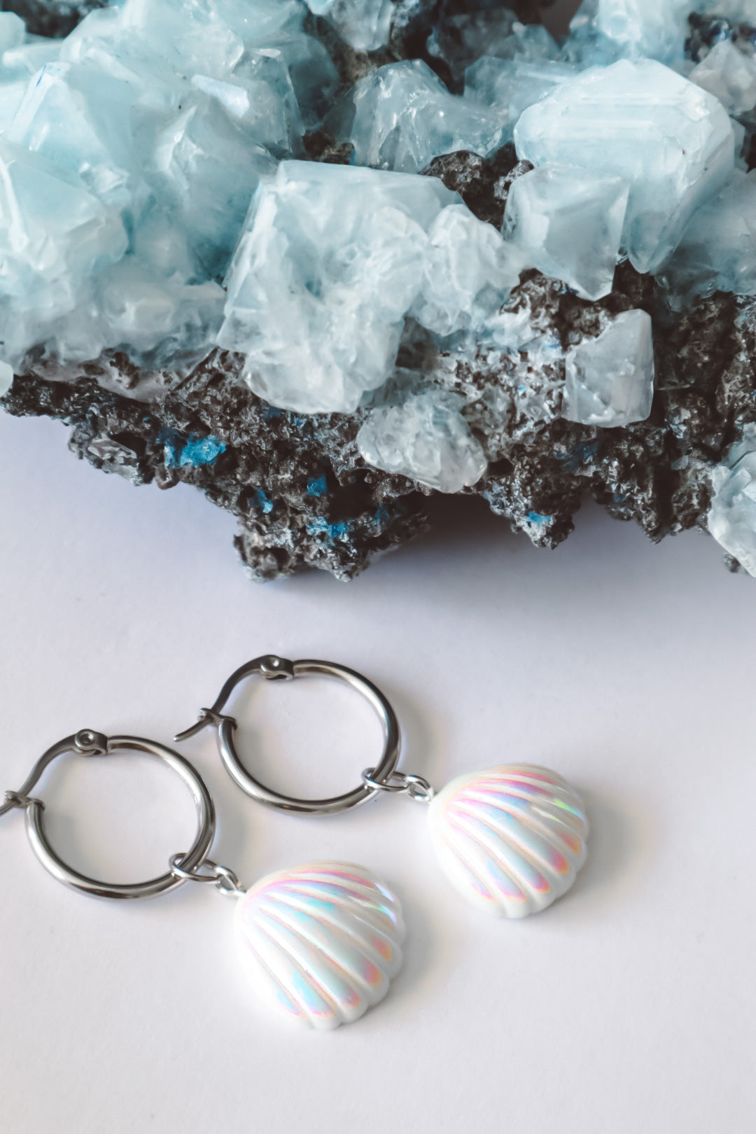 Seashell Aura Huggie Hoop Earrings Silver, white mermaid core jewelry, ocean inspired syle, handmade shell earrings, summer jewellery, mermaidcore earrings, jewelry made with shells, festival jewelry, festival earrings