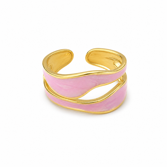 Pink and gold ring on a white background