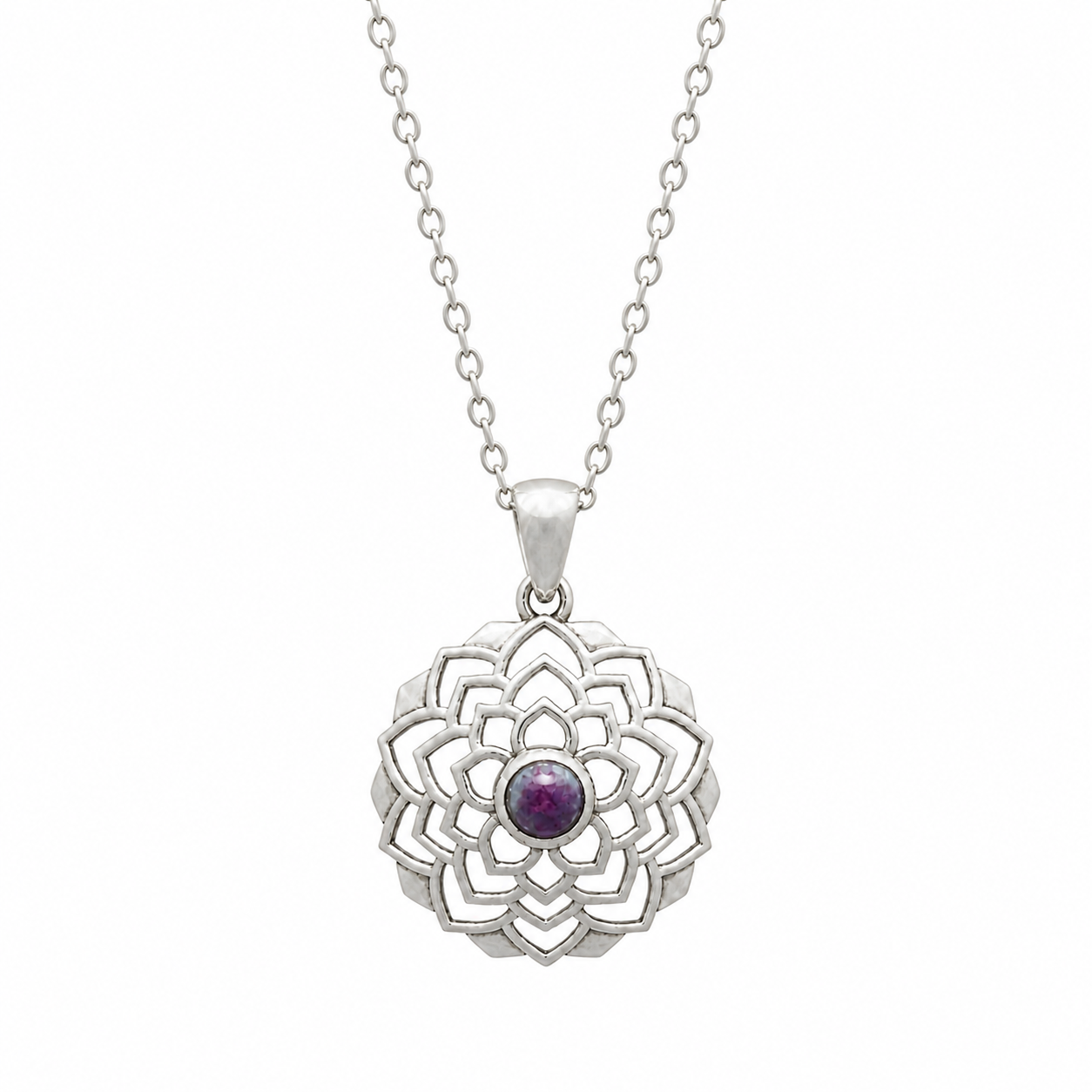 Silver mandala pendant with a purple gemstone on a white background