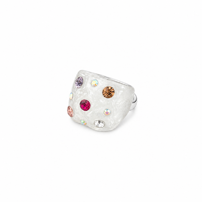 Silver ring with colorful gemstones on a white background