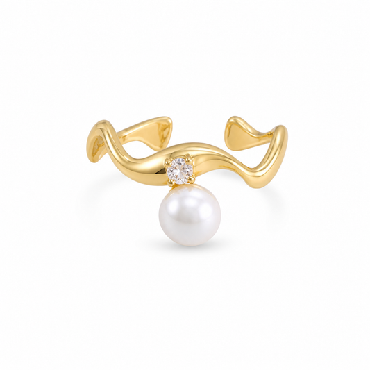 Gold ring with a pearl and diamond on a white background
