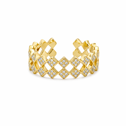 Gold hoop earrings with lattice design and clear stones on a white background