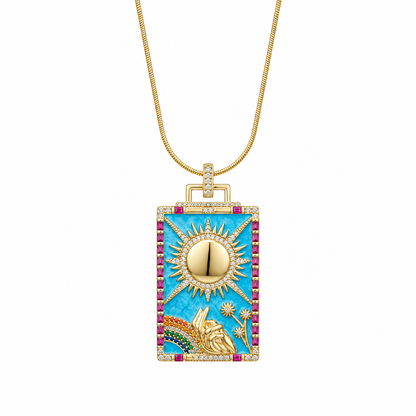 Luxury pendant necklace with gold and blue design on a white background