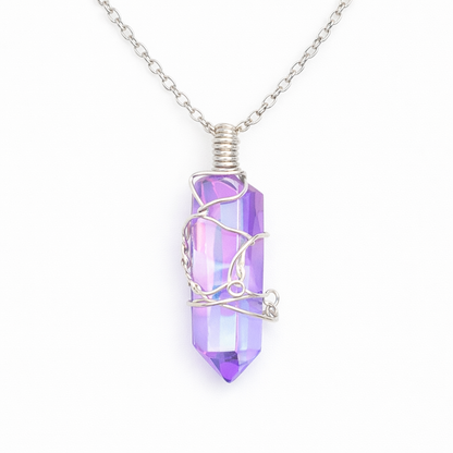 Purple crystal pendant necklace on a white background