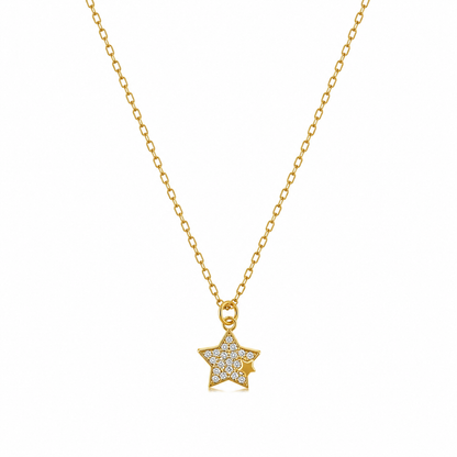 Gold necklace with a star-shaped pendant on a white background