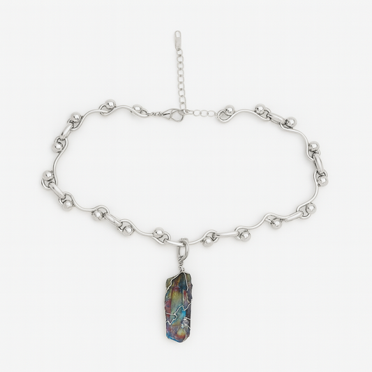 Silver chain necklace with a colorful stone pendant on a white background