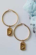 Load image into Gallery viewer, celestial earrings, celestial hoop earrings gold, gold earrings, gold hoop earrings, statement hoop earrings, celestial moon jewelry, malta jewellery, malta jewellery brand, gold moon earrings, handmade moon earrings
